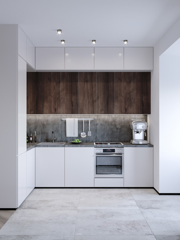 Design ideas for a small modern l-shaped kitchen/diner in Frankfurt with a single-bowl sink, flat-panel cabinets, white cabinets, quartz worktops, grey splashback, cement tile splashback, ceramic flooring, no island, grey floors, stainless steel appliances and grey worktops.