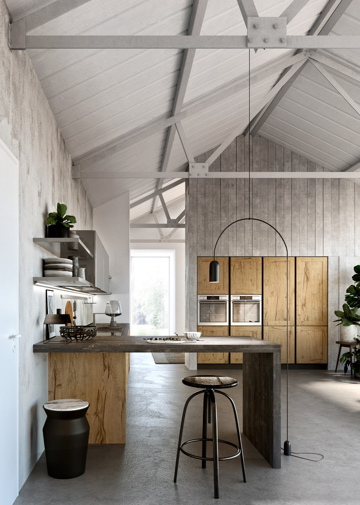 Modern inredning av ett mellanstort kök, med en dubbel diskho, skåp i shakerstil, skåp i mellenmörkt trä, laminatbänkskiva, vita vitvaror, betonggolv, en köksö och grått golv