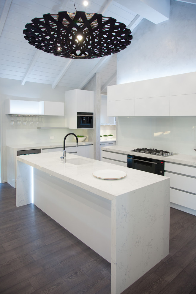 Photo of a large contemporary u-shaped kitchen/diner in Auckland with an island.