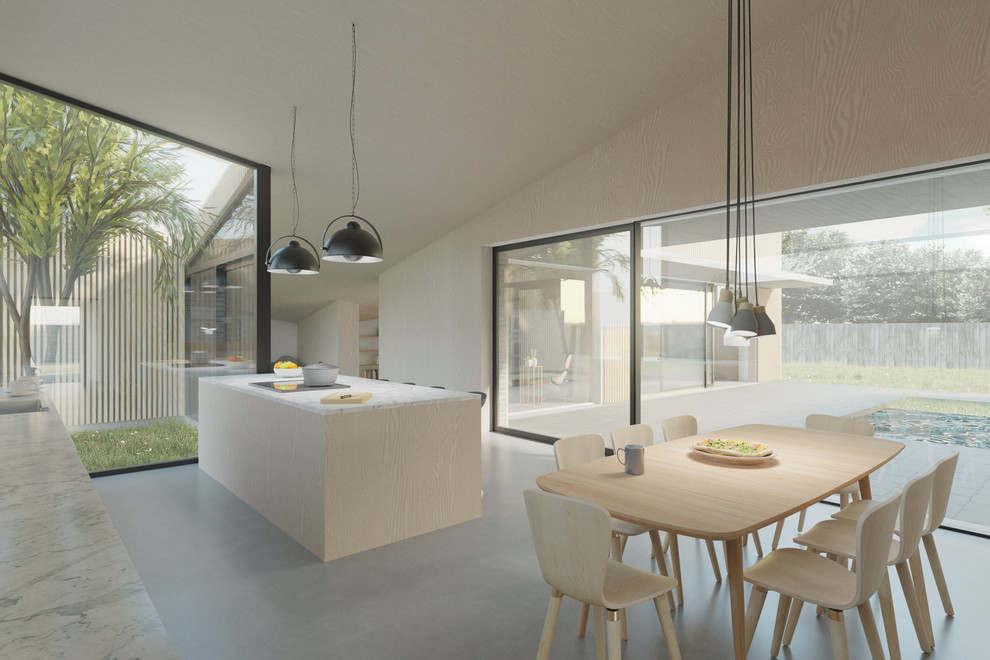 Large contemporary single-wall kitchen/diner in Cambridgeshire with an island.