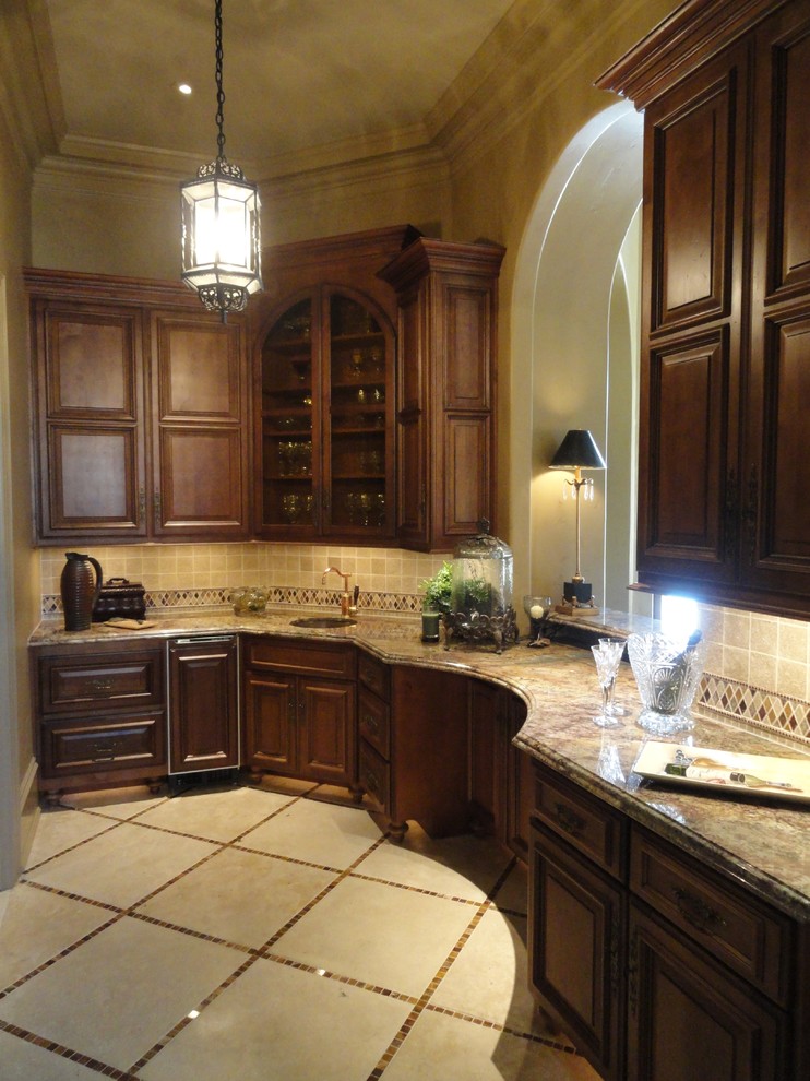 Example of a tuscan kitchen design in Houston