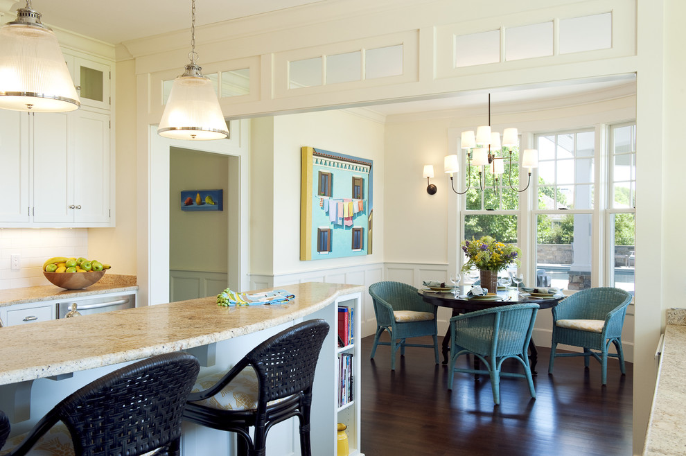 Inspiration for a transitional eat-in kitchen remodel in Boston with granite countertops