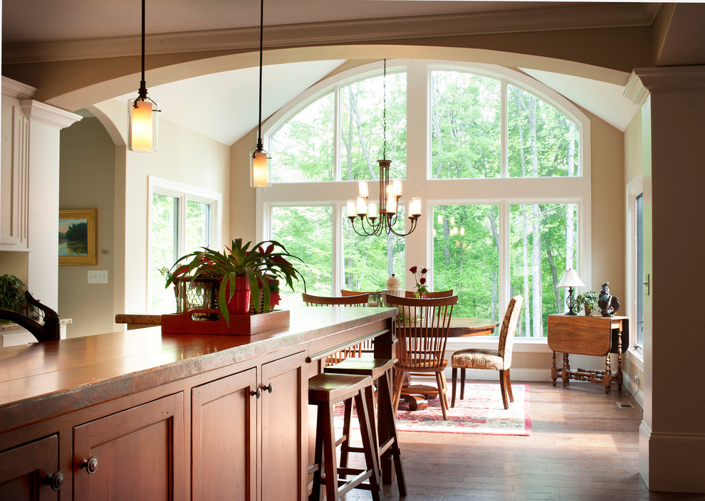 Example of a large classic kitchen design in Other with an island