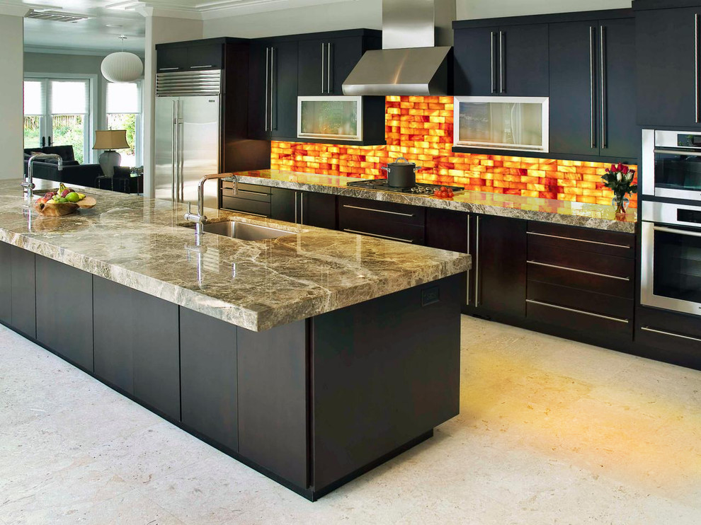 Inspiration for a mid-sized contemporary u-shaped ceramic tile and beige floor enclosed kitchen remodel in Other with a double-bowl sink, flat-panel cabinets, black cabinets, quartzite countertops, orange backsplash, stainless steel appliances and an island