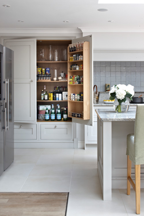 Unique Pantry Inspirations: White Cabinets with Grey Backsplash and Marble Countertop