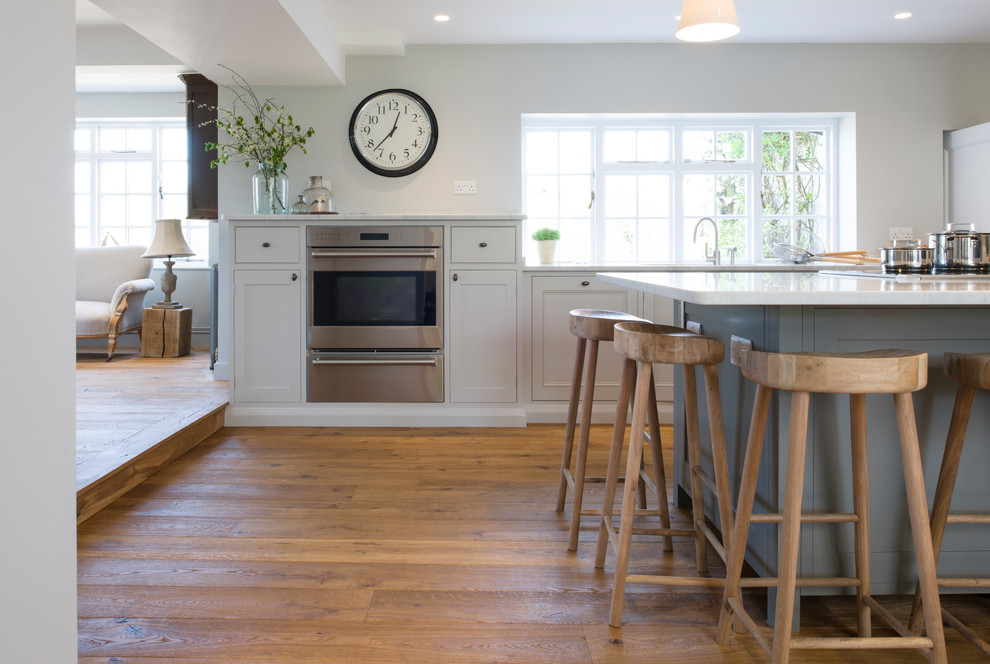 Example of a transitional kitchen design in Surrey
