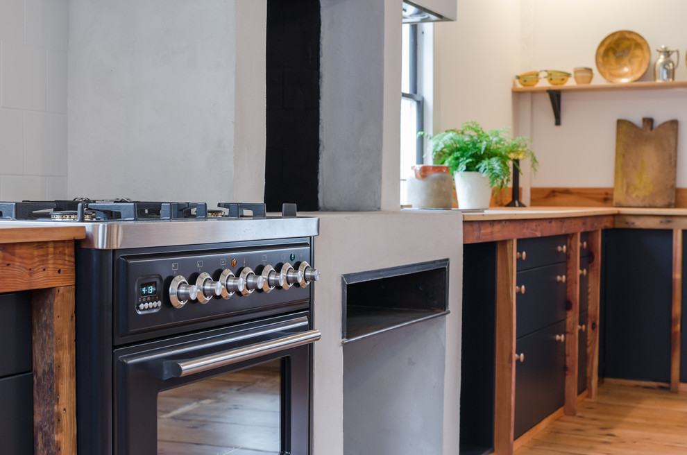 Стильный дизайн: кухня в скандинавском стиле с деревянной столешницей - последний тренд