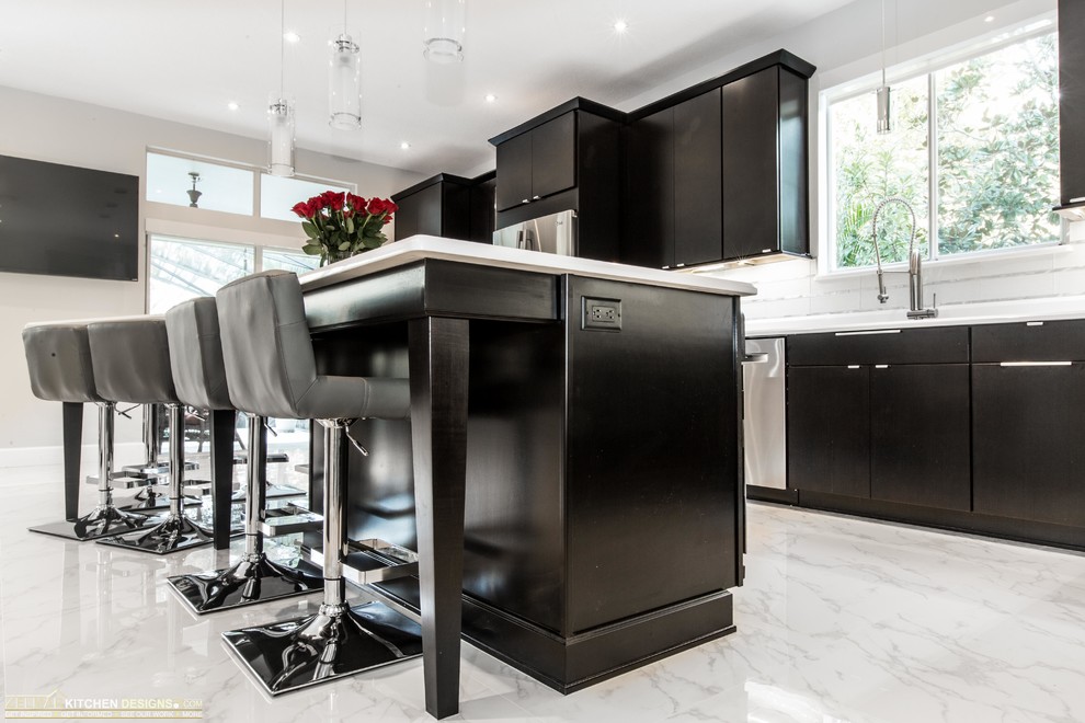 Eat-in kitchen - large contemporary l-shaped eat-in kitchen idea in Orlando with an undermount sink, flat-panel cabinets, dark wood cabinets, quartz countertops and an island