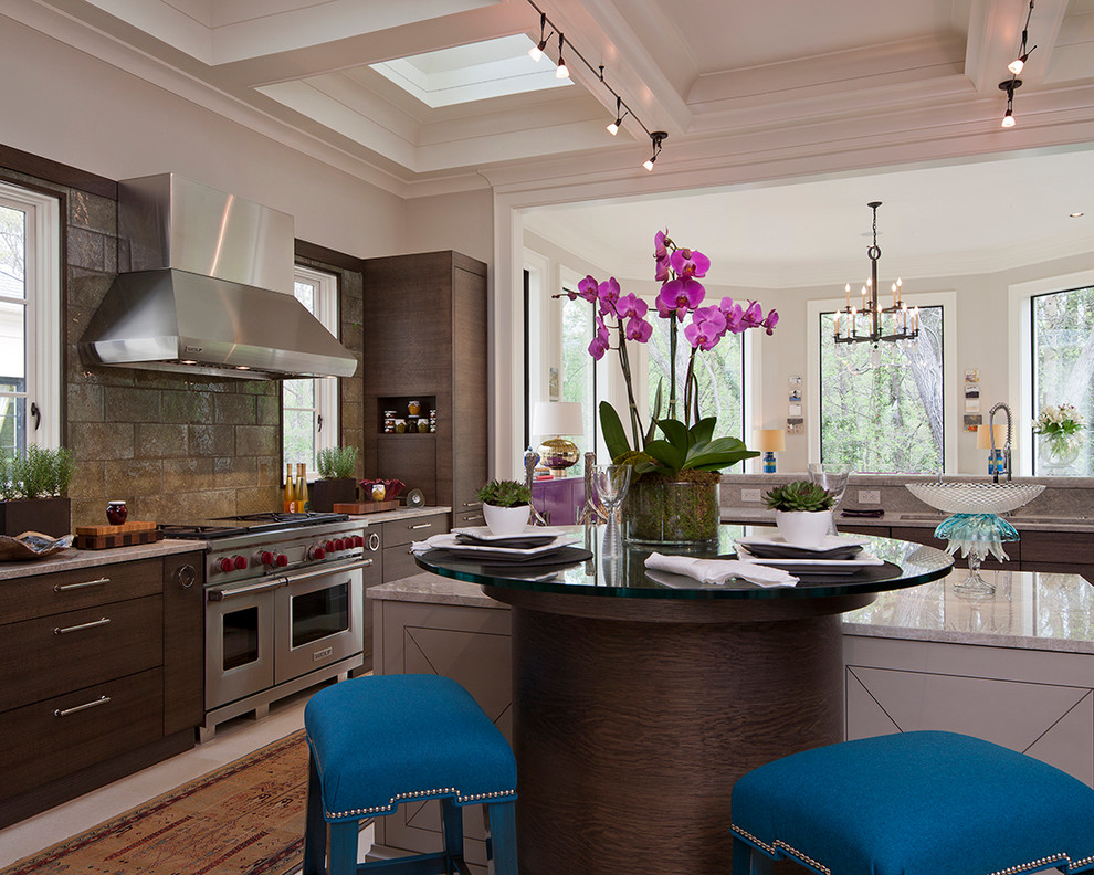 Elegant kitchen photo in Atlanta with dark wood cabinets