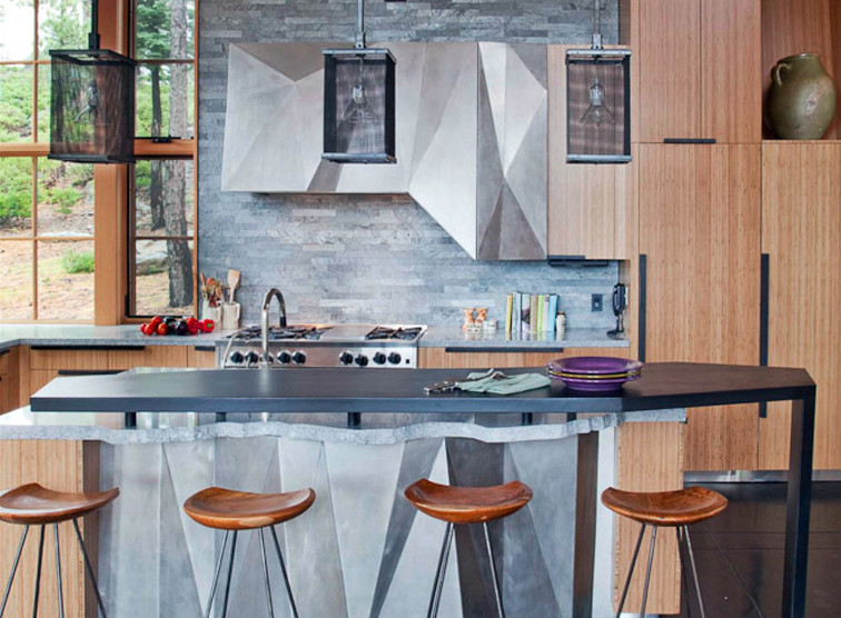 This is an example of a rustic kitchen in San Francisco with flat-panel cabinets, medium wood cabinets, grey splashback, stone tiled splashback and stainless steel appliances.