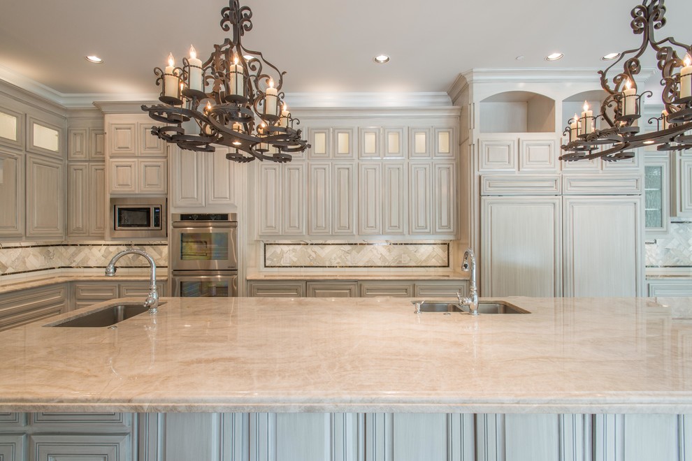 Kitchen - traditional kitchen idea in Dallas with quartzite countertops