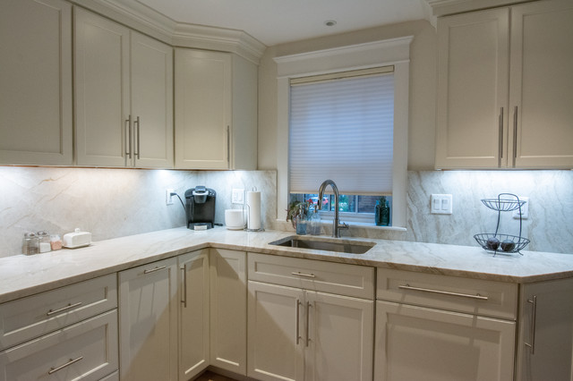 Taj Mahal Quartzite Kitchen w/ Full Height Backsplash - Traditional ...