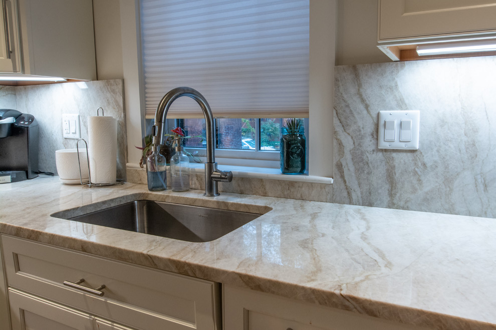 Taj Mahal Quartzite Kitchen w/ Full Height Backsplash Traditional