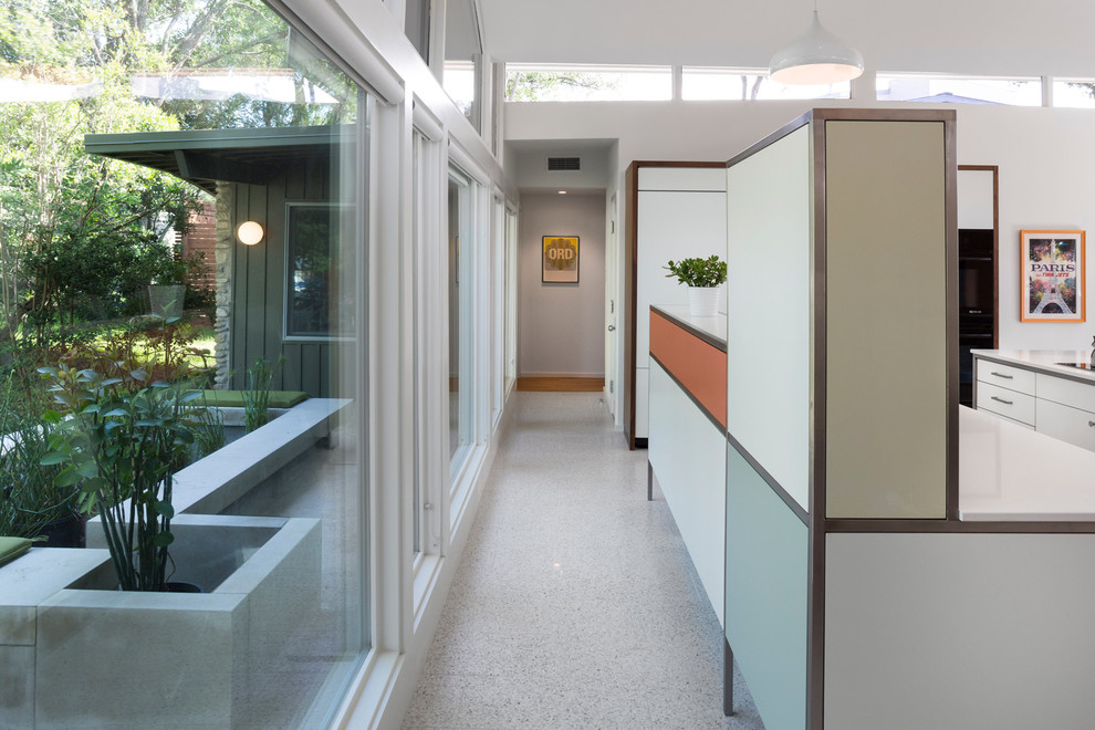 This is an example of a midcentury kitchen in Austin.