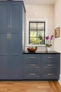 Light blue kitchen cabinets with black countertops deals