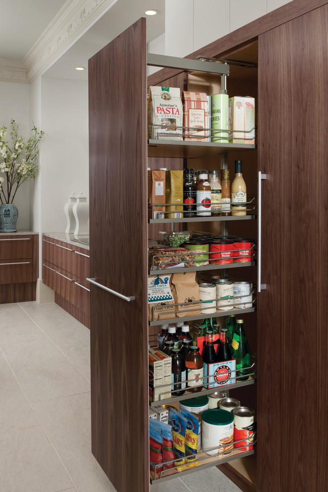 This is an example of a large modern l-shaped kitchen pantry in Houston with a single-bowl sink, flat-panel cabinets, brown cabinets, engineered stone countertops, stainless steel appliances, porcelain flooring and grey floors.