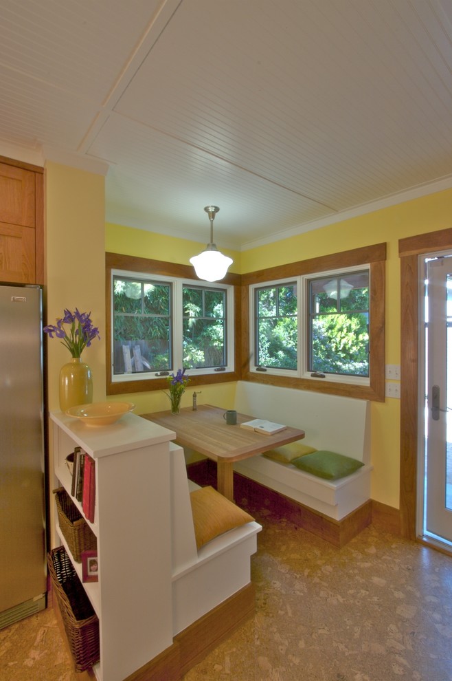 Inspiration for a small traditional l-shaped kitchen/diner in San Francisco with a double-bowl sink, shaker cabinets, medium wood cabinets, granite worktops, green splashback, stone slab splashback, stainless steel appliances, cork flooring, an island and beige floors.