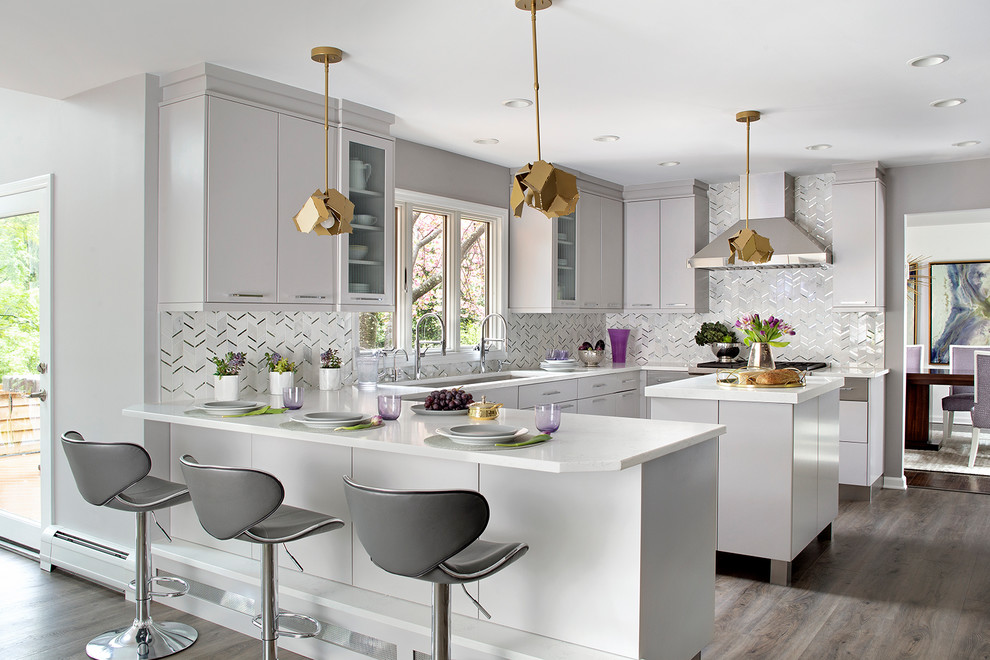Photo of a medium sized contemporary kitchen in New York with a triple-bowl sink, flat-panel cabinets, purple cabinets, engineered stone countertops, metallic splashback, mirror splashback, stainless steel appliances, vinyl flooring, an island, grey floors and white worktops.