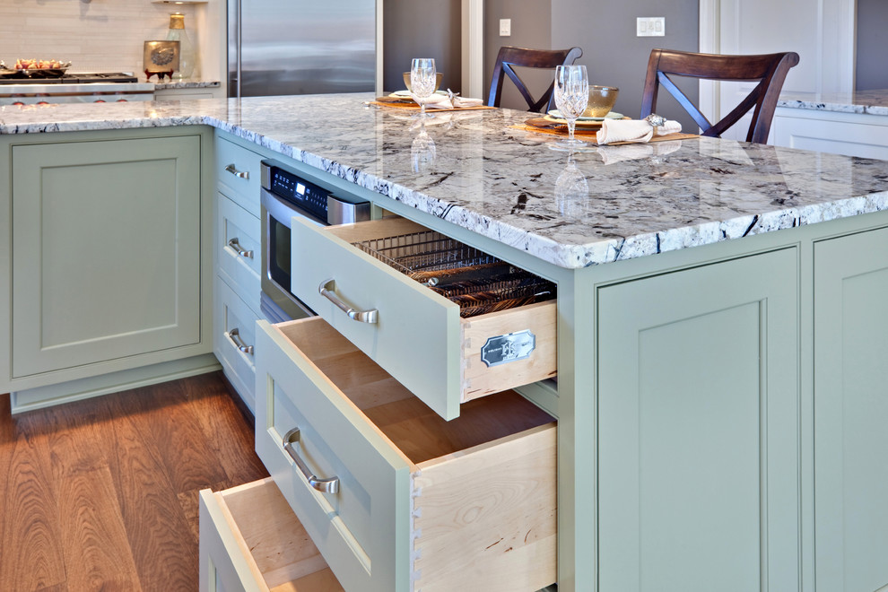 Inspiration for a contemporary kitchen remodel in Atlanta with granite countertops, beaded inset cabinets, green cabinets and stainless steel appliances