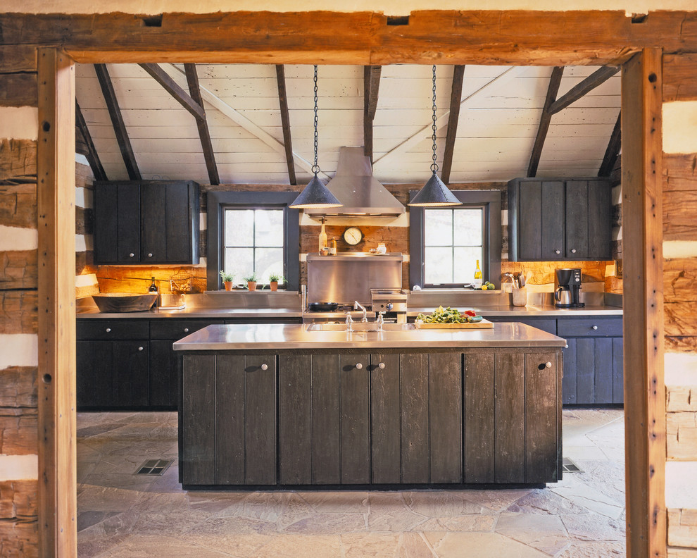 Rustic kitchen in Austin with stainless steel appliances.