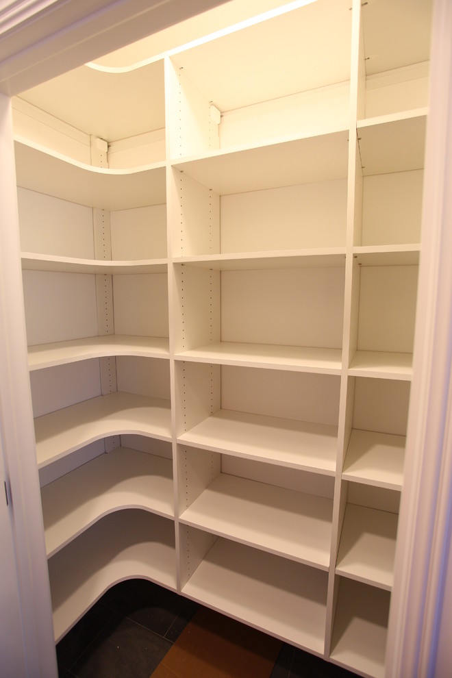 Medium sized traditional u-shaped kitchen pantry in New York.
