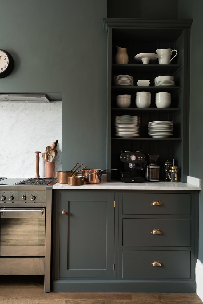 Example of a transitional kitchen design in London