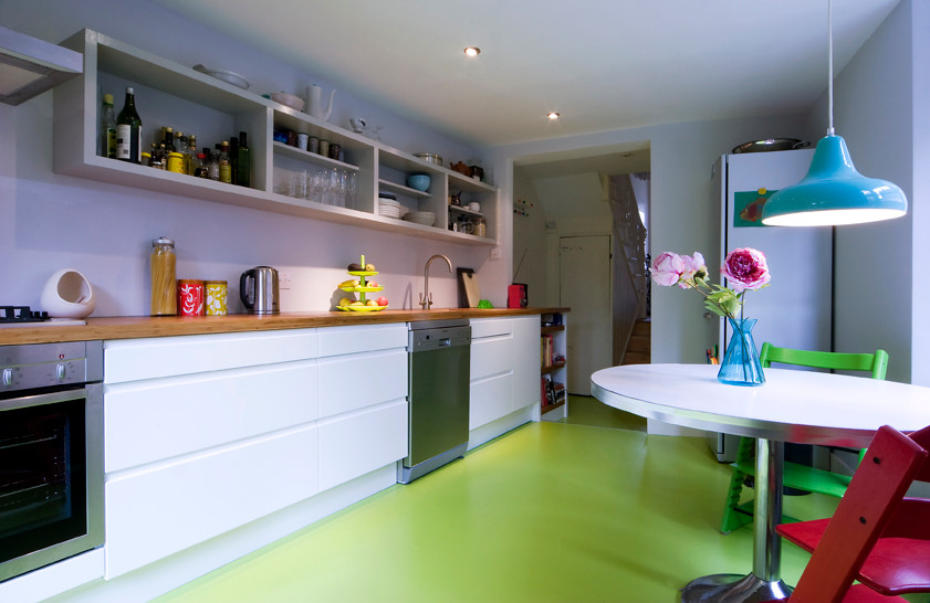 Modern kitchen in London with vinyl flooring.
