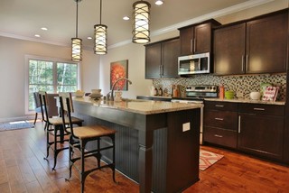 Gorgeous two story kitchen, granite countertops, pendant lighting, blue  mosaic backsplash tile, g…