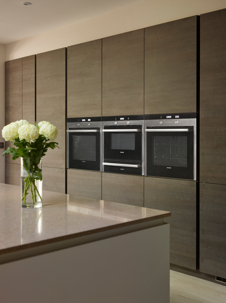 This is an example of a large contemporary kitchen in Berkshire.