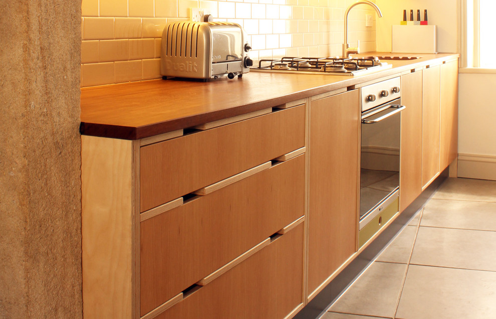 Plywood Kitchen Cabinets Or Stainless Steel Cabinets, whicch one best fits the kitchen
