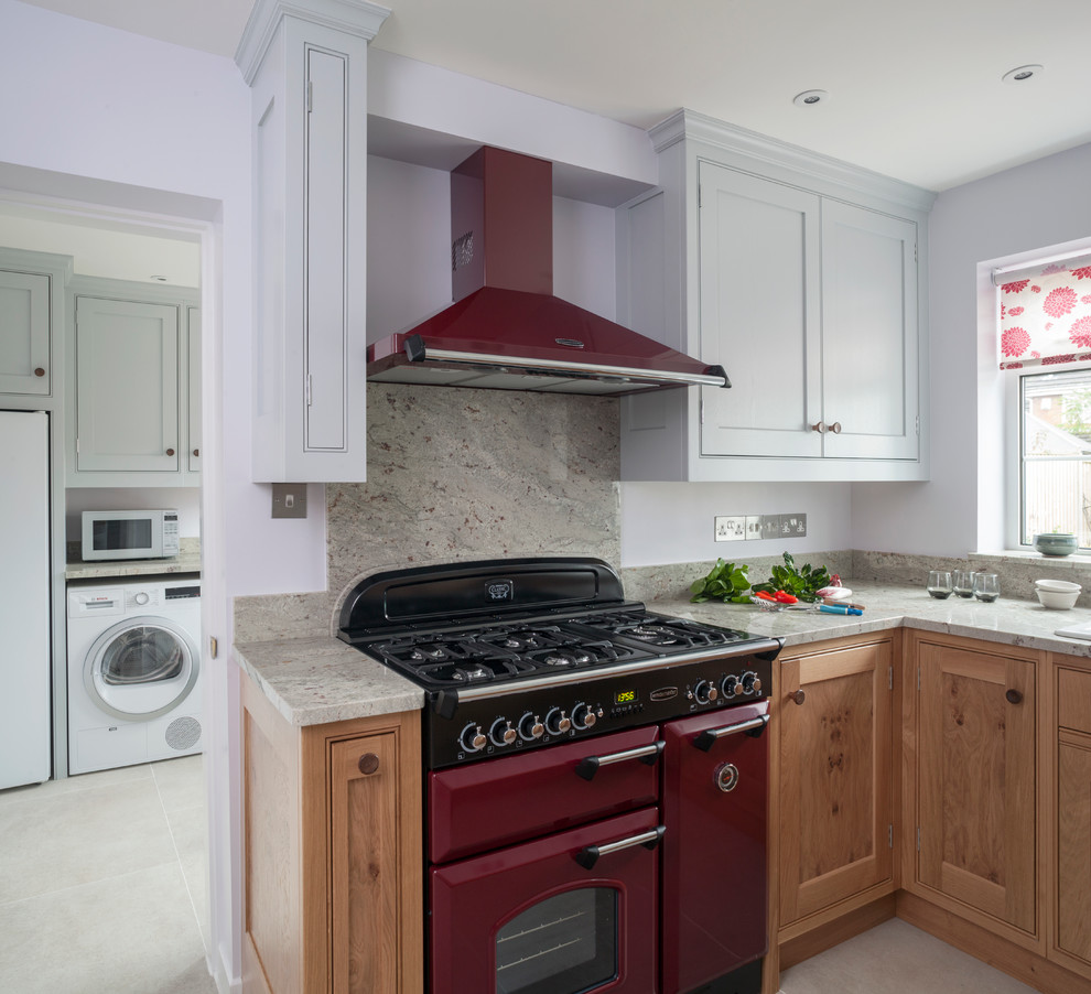 Photo of a small traditional u-shaped kitchen in Wiltshire with beaded cabinets and granite worktops.