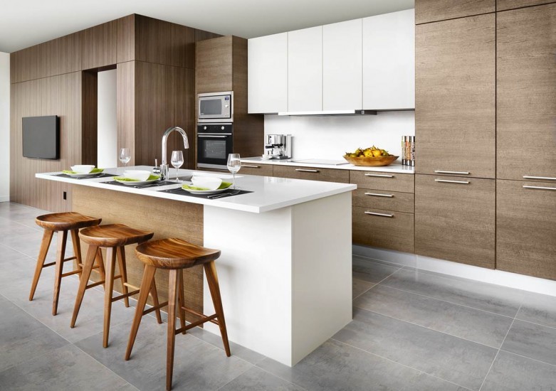 Large minimalist single-wall eat-in kitchen photo in Vancouver with a single-bowl sink, flat-panel cabinets, medium tone wood cabinets, quartzite countertops, white backsplash, an island and paneled appliances
