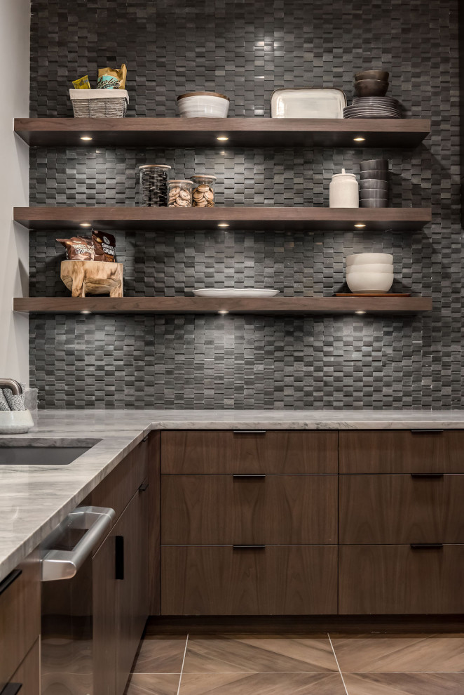 Photo of a modern u-shaped kitchen/diner in Salt Lake City with a built-in sink, flat-panel cabinets, dark wood cabinets, black splashback, stainless steel appliances, no island and grey worktops.