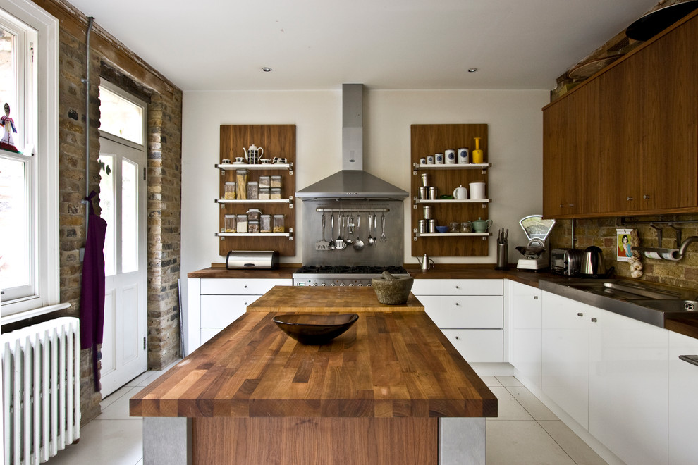 Inspiration for a medium sized industrial galley kitchen/diner in London.