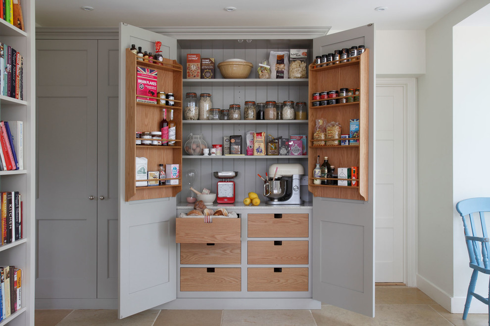 Country kitchen pantry photo in Surrey with gray cabinets