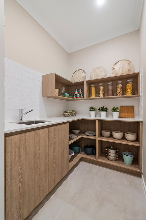 Medium-Tone Cabinets and Quartz Countertops: Open Kitchen Pantry Storage