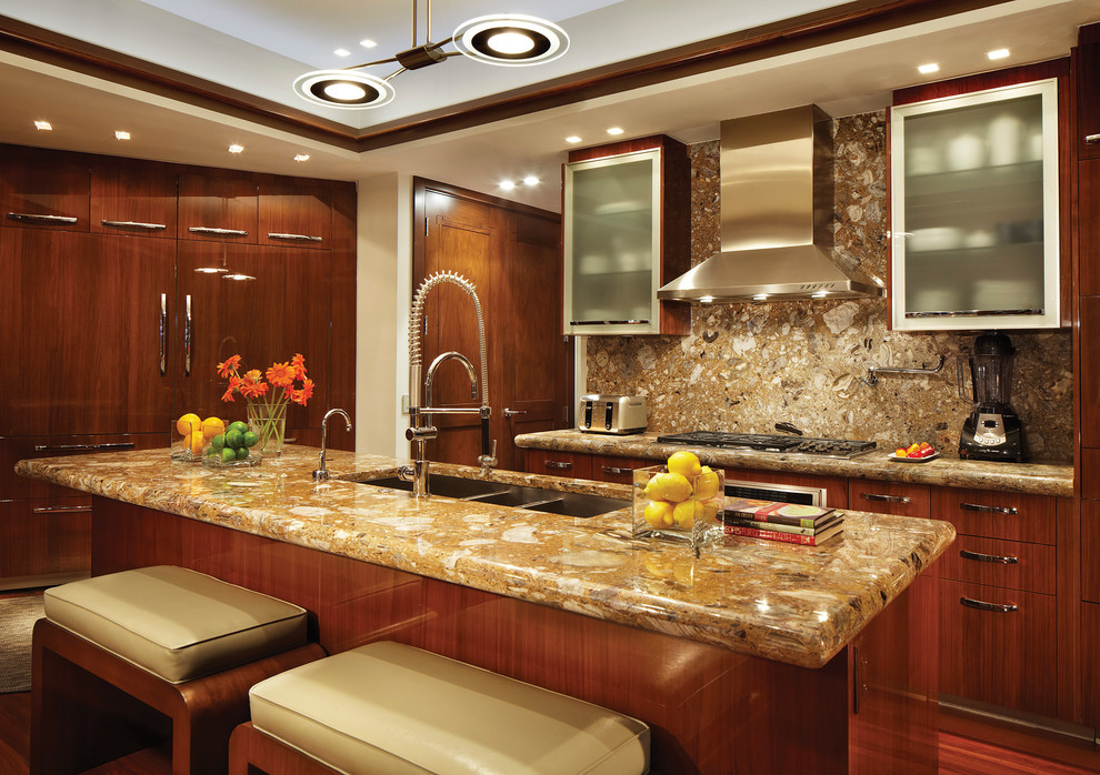 Photo of a modern kitchen in Miami with a triple-bowl sink, flat-panel cabinets, medium wood cabinets, beige splashback and integrated appliances.