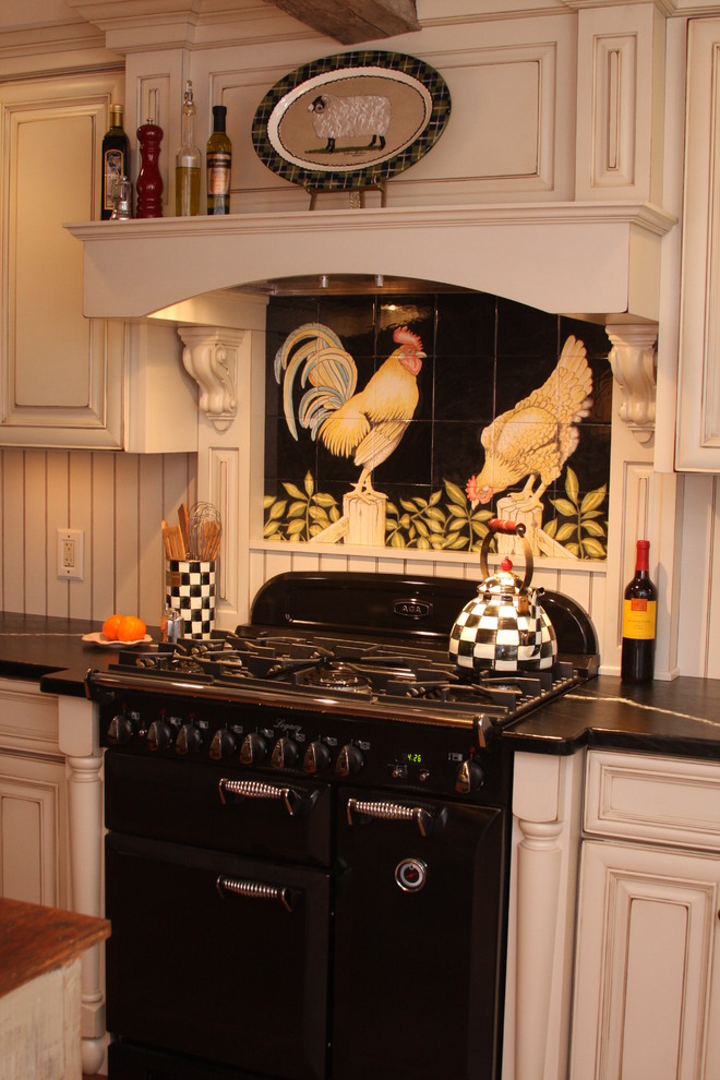 Example of a cottage kitchen design in DC Metro with soapstone countertops