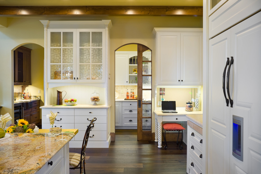 Example of a classic kitchen design in Portland with granite countertops