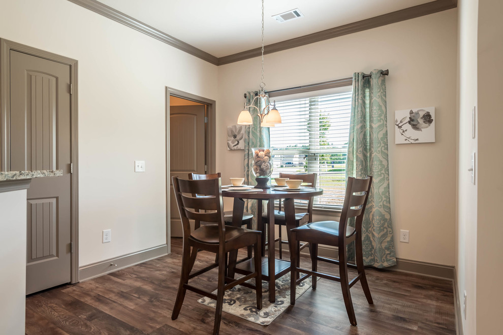 Inspiration for a transitional dark wood floor dining room remodel in Atlanta with beige walls