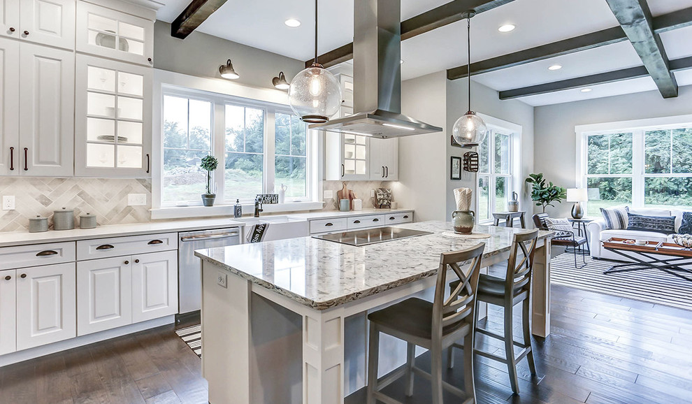 Inspiration for a huge country l-shaped medium tone wood floor eat-in kitchen remodel in Other with a farmhouse sink, white cabinets, quartz countertops, gray backsplash, stainless steel appliances, an island and gray countertops