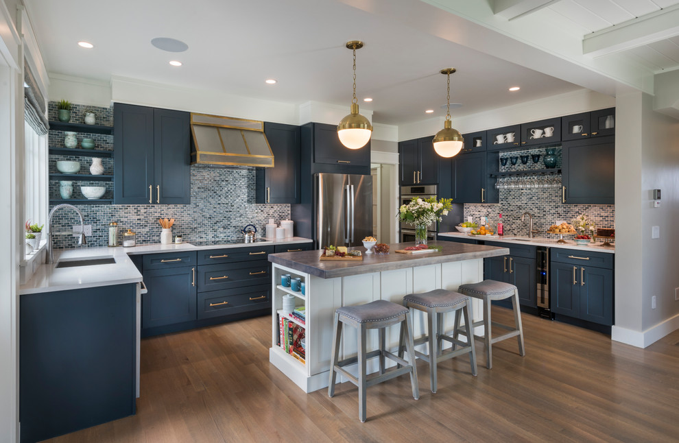 Eat-in kitchen - coastal u-shaped dark wood floor eat-in kitchen idea in Providence with an undermount sink, shaker cabinets, blue cabinets, blue backsplash, stainless steel appliances and an island