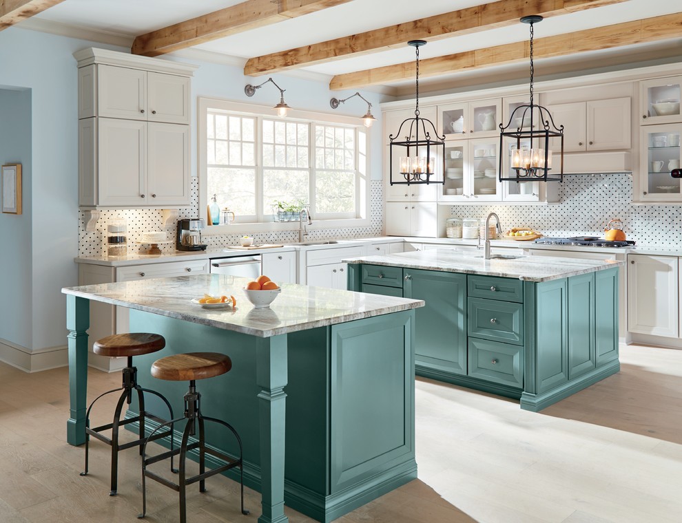 Inspiration for a large contemporary l-shaped light wood floor and beige floor enclosed kitchen remodel in Other with an undermount sink, recessed-panel cabinets, blue cabinets, granite countertops, white backsplash, glass tile backsplash, stainless steel appliances and two islands