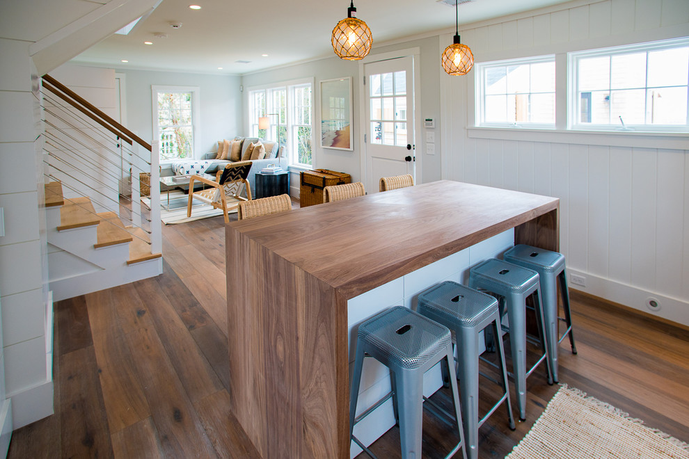 This is an example of a nautical kitchen in Boston with wood worktops and an island.