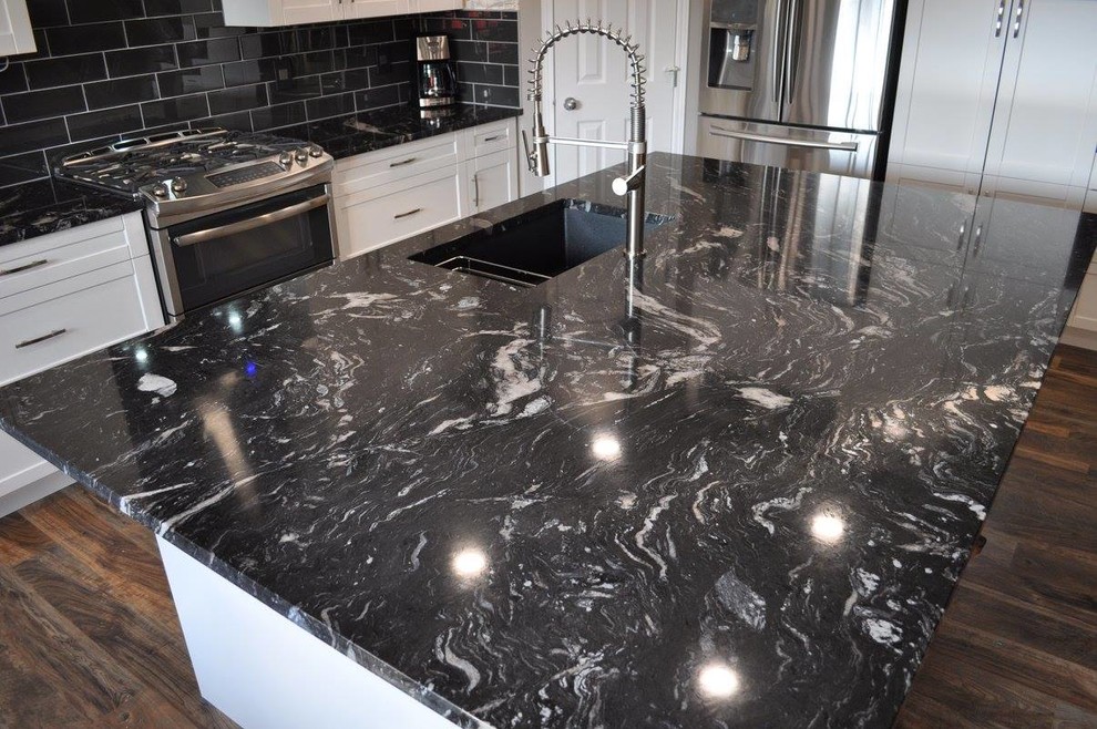 black forest granite countertops with white cabinets