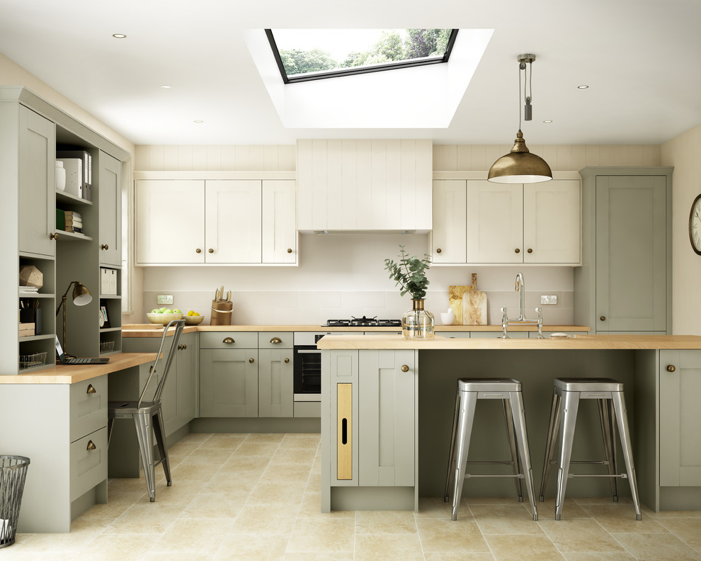 This is an example of a large classic l-shaped enclosed kitchen in Other with shaker cabinets, beige cabinets, wood worktops, an island, beige floors, a belfast sink and integrated appliances.
