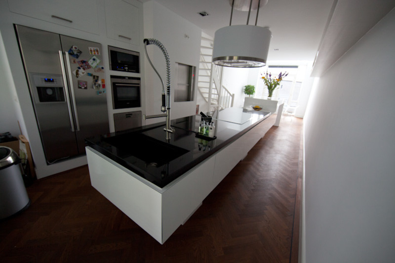 Example of a trendy kitchen design in Amsterdam