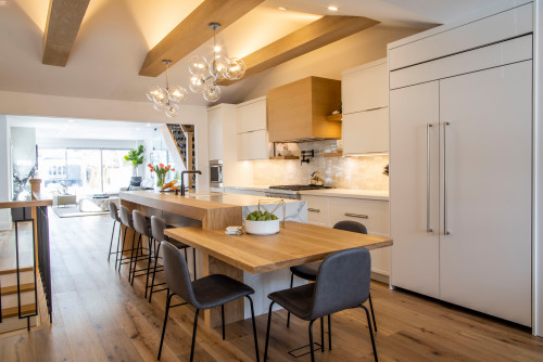Toronto luxury penthouse kitchen with high-end RTA cabinets, wood accents, and modern built-in island design (2025)