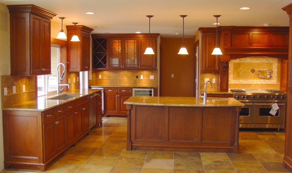 This is an example of a large classic u-shaped kitchen/diner in Seattle with a submerged sink, open cabinets, medium wood cabinets, granite worktops, beige splashback, ceramic splashback, stainless steel appliances, ceramic flooring, an island and beige floors.