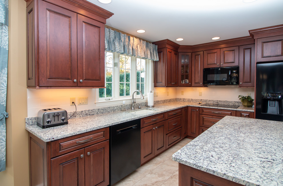 Traditional Cognac/Antique Black Cherry stain finishes with Crema Pearl